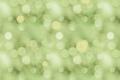Groene achtergrond met zachte lichtvlekken